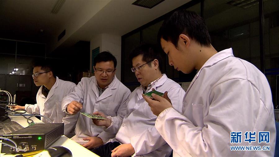 (圖文互動)讓五星紅旗飄揚在世界“超算”之巔——記國防科大計算機學院院長廖湘科