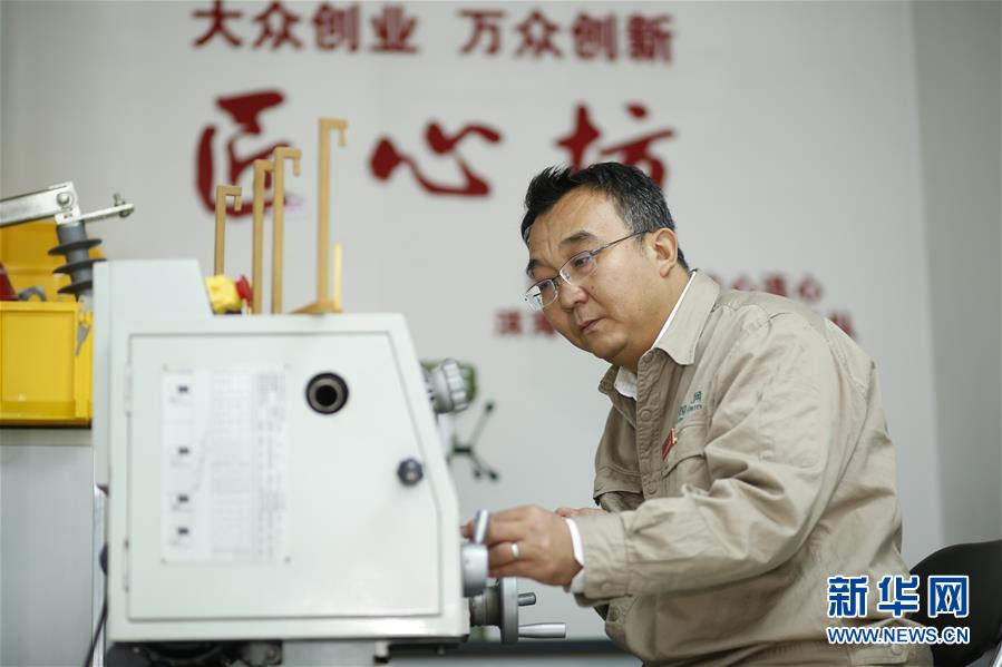 (改革先鋒風采·圖文互動)(3)張黎明:譜寫新時代勞動者之歌