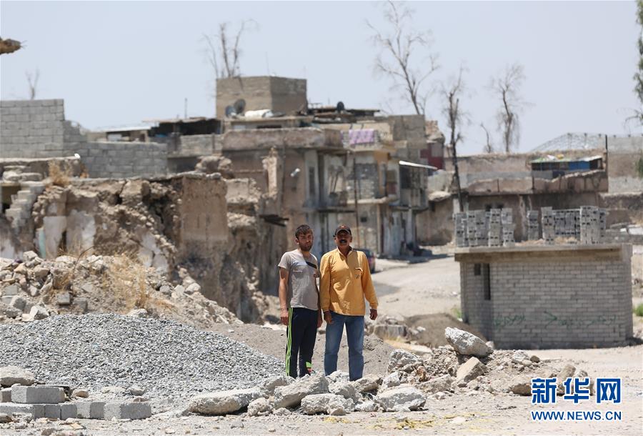 （國(guó)際·圖文互動(dòng)）（2）通訊：中企員工愛心捐款助摩蘇爾老城民眾重燃生活希望