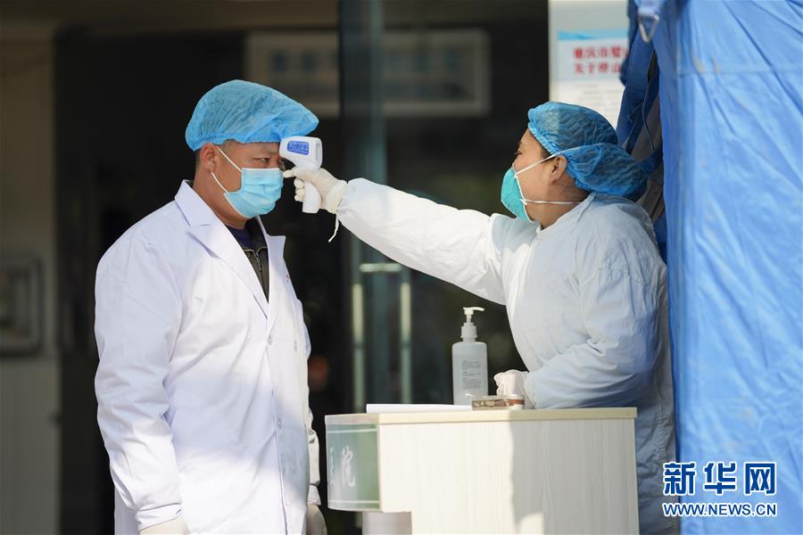 (聚焦疫情防控·圖文互動)(5)一對抗疫夫妻的“一線連軸轉”