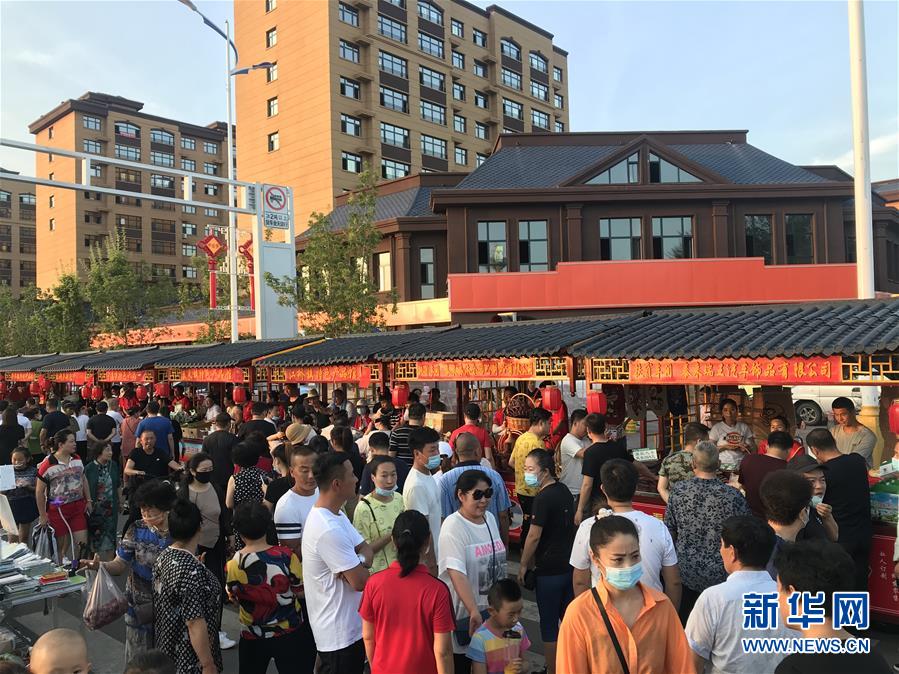 (決戰決勝脫貧攻堅·圖文互動)(2)扶貧夜市讓小城“煙火氣”升騰“致富味”