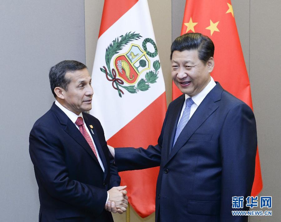 7月16日，國家主席習(xí)近平在巴西首都巴西利亞會見秘魯總統(tǒng)烏馬拉。新華社記者 劉建生 攝 