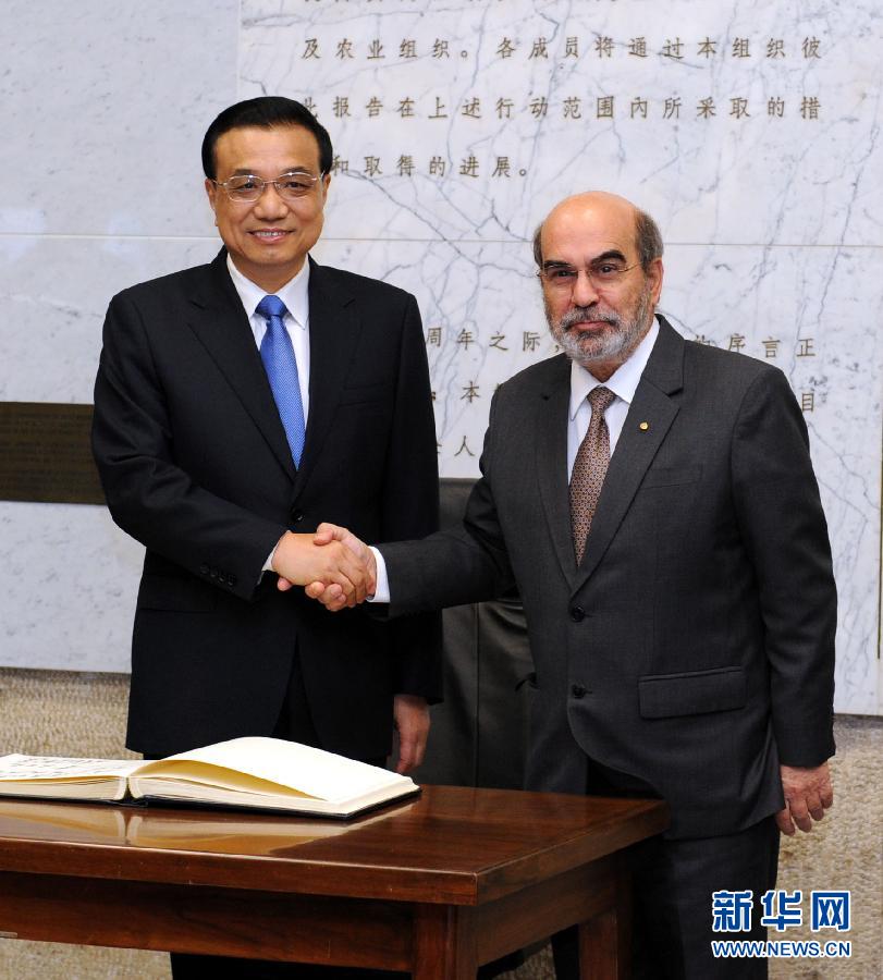 10月15日，中國國務院總理李克強在羅馬會見聯(lián)合國糧農(nóng)組織總干事格拉齊亞諾。 新華社記者 饒愛民 攝