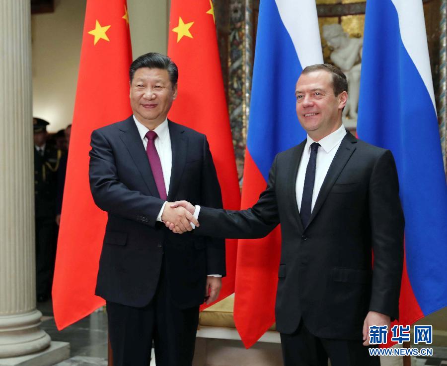 7月4日，國家主席習近平在莫斯科會見俄羅斯總理梅德韋杰夫。新華社記者 劉衛兵 攝