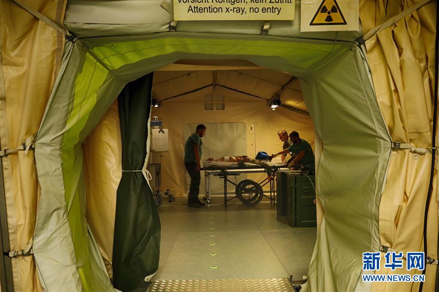 (國際·圖文互動)(1)“共同的理念,讓合作更深入更順暢”——走進中德“聯合救援-2019”衛(wèi)勤實兵聯合演習德方野戰(zhàn)二級醫(yī)院