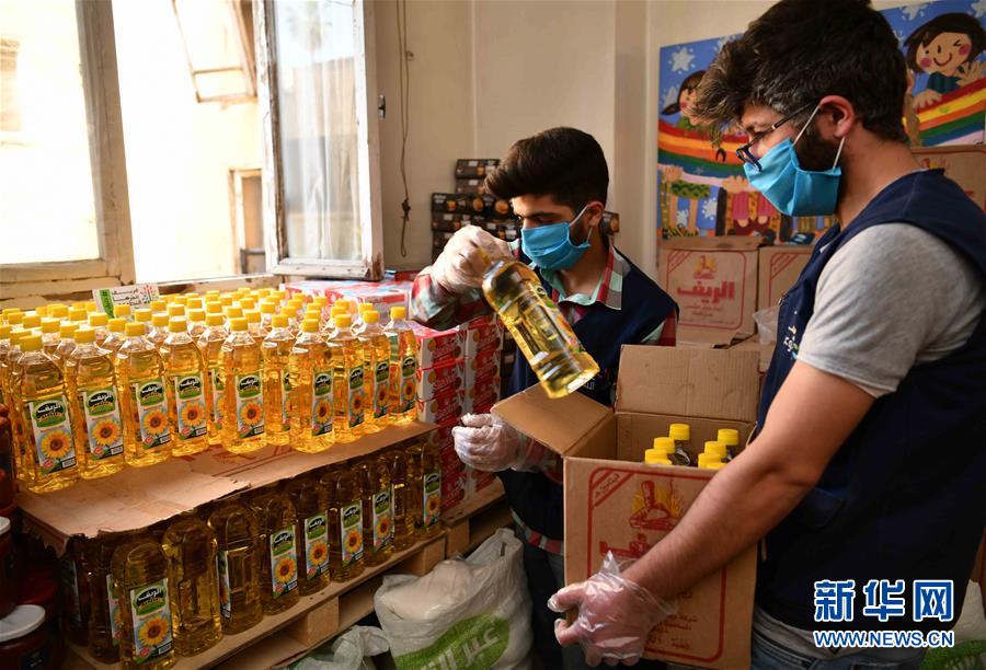 (國際疫情·圖文互動)(6)通訊:疫情中,那抹笑容最難忘——記向困難家庭發放愛心包裹的敘利亞青年志愿者